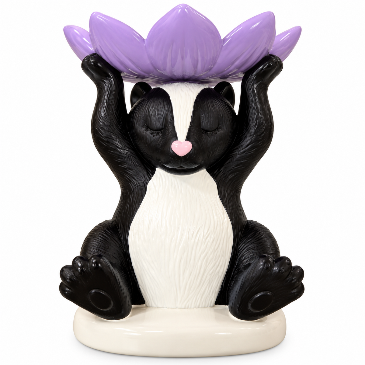 Porta vela decorativo de zorrillo con flor de loto morada